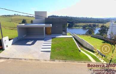 Imagem: A casa possui 4 Dormitórios, 1 Suíte, 4 Banheiros, 7 Vagas