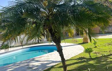 Imagem: A casa em condomínio possui 3 Dormitórios, 3 Suítes, 5 Banheiros