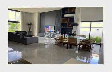 Imagem: A casa em condomínio possui 3 Dormitórios, 3 Suítes, 4 Banheiros