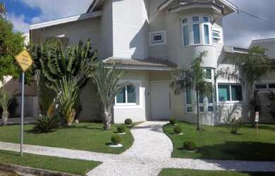 Imagem: A casa em condomínio à venda possui 5 Dormitórios, 5 Suítes