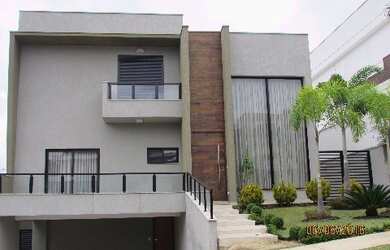 Imagem: A casa em condomínio possui 5 Dormitórios, 5 Suítes, 7 Banheiros