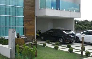 Imagem: A casa em condomínio possui 5 Dormitórios, 5 Suítes, 7 Banheiros