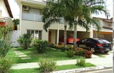 Imagem: A casa em condomínio possui 4 Dormitórios, 4 Suítes, 450m²