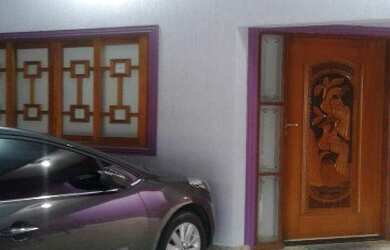 Imagem: A casa possui 2 Dormitórios, 2 Banheiros, 3 Vagas na garagem