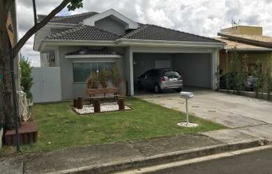 Imagem: A casa em condomínio possui 4 Dormitórios, 4 Suítes, 5 Banheiros
