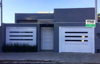 Imagem: A casa possui 3 Dormitórios, 3 Suítes, 4 Banheiros, 2 Vagas