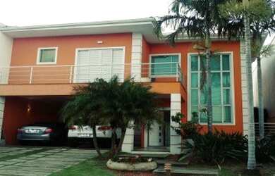 Imagem: A casa possui 3 Dormitórios, 2 Suítes, 5 Banheiros, 2 Vagas