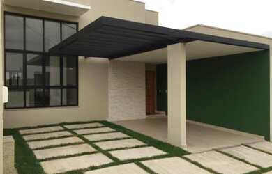 Imagem: A casa possui 3 Dormitórios, 1 Suíte, 2 Vagas na garagem