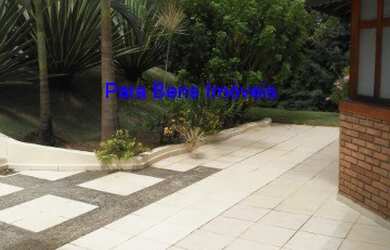 Imagem: A chácara possui 5 Dormitórios, 5 Suítes, 7 Banheiros, 8