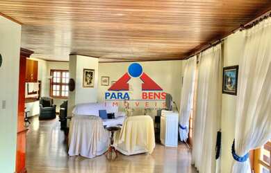 Imagem: A casa em condomínio possui 4 Dormitórios, 4 Suítes, 6 Banheiros