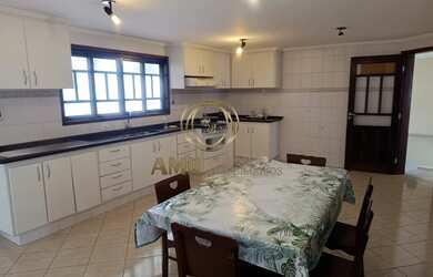 Imagem: A casa à venda possui 4 Dormitórios, 3 Suítes, 4 Banheiros