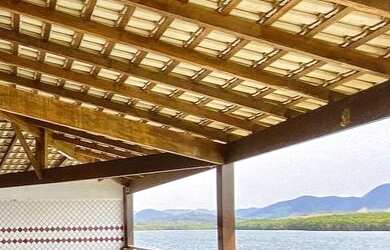 Imagem: A casa possui 4 Dormitórios, 4 Suítes, 6 Banheiros, 3 Vagas