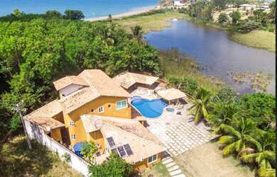 Imagem: A casa possui 6 Dormitórios, 6 Suítes, 7 Banheiros, 8 Vagas