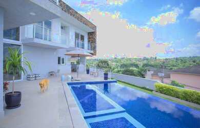 Imagem: A casa em condomínio possui 4 Dormitórios, 3 Suítes, 5 Banheiros