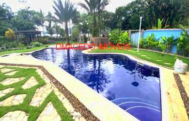 Imagem: A casa em condomínio possui 4 Dormitórios, 4 Suítes, 4 Banheiros