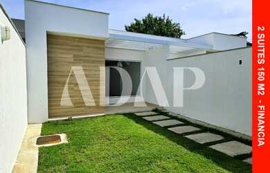 Imagem: A casa possui 2 Dormitórios, 1 Suíte, 2 Banheiros, 2 Vagas