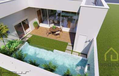 Imagem: A casa possui 3 Dormitórios, 3 Suítes, 5 Banheiros, 4 Vagas