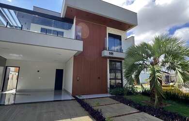 Imagem: A casa possui 4 Dormitórios, 4 Suítes, 6 Banheiros, 4 Vagas