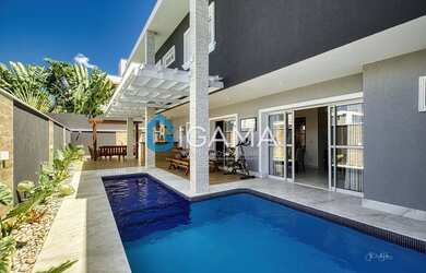 Imagem: A casa em condomínio possui 4 Dormitórios, 3 Suítes, 5 Banheiros