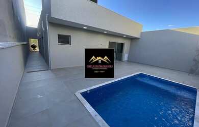 Imagem: A casa possui 3 Dormitórios, 1 Suíte, 2 Banheiros, 2 Vagas