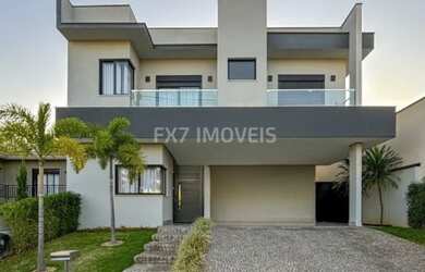 Imagem: A casa em condomínio possui 4 Dormitórios, 4 Suítes, 6 Banheiros