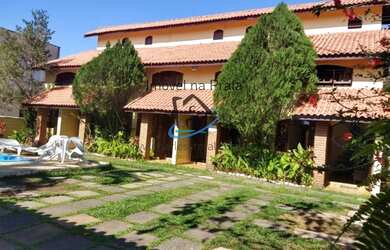 Imagem: A casa possui 6 Dormitórios, 6 Suítes, 7 Banheiros, 6 Vagas