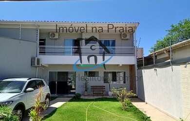 Imagem: A casa possui 3 Dormitórios, 4 Suítes, 1 Banheiro, 3 Vagas