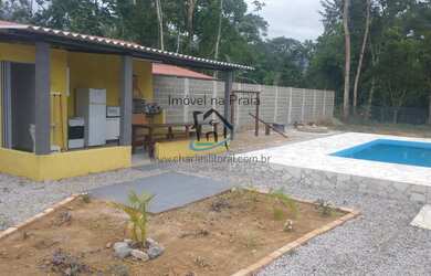 Imagem: A casa possui 4 Dormitórios, 4 Suítes, 4 Banheiros, 15 Vagas