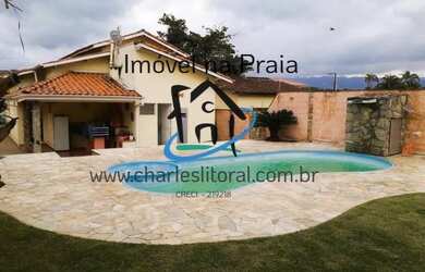 Imagem: A casa possui 3 Dormitórios, 2 Suítes, 5 Banheiros, 5 Vagas