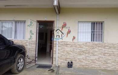 Imagem: A casa possui 2 Dormitórios, 1 Banheiro, 2 Vagas na garagem