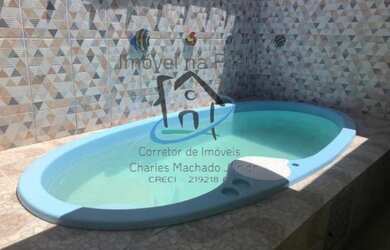 Imagem: A casa possui 2 Dormitórios, 2 Banheiros, 2 Vagas na garagem