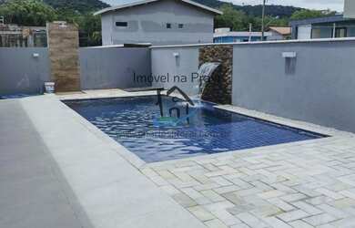 Imagem: A casa em condomínio possui 4 Dormitórios, 4 Suítes, 5 Banheiros