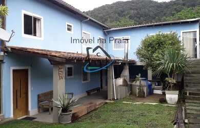 Imagem: A casa possui 4 Dormitórios, 3 Suítes, 4 Banheiros, 4 Vagas