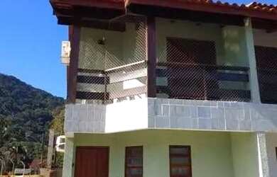 Imagem: A casa possui 2 Dormitórios, 2 Suítes, 3 Banheiros, 1 Vaga