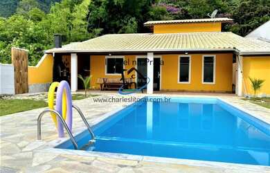 Imagem: A casa possui 4 Dormitórios, 4 Suítes, 5 Banheiros, 4 Vagas