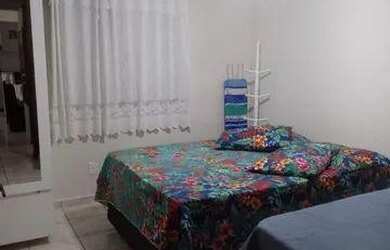 Imagem: O apartamento possui 2 Dormitórios, 1 Suíte, 2 Banheiros