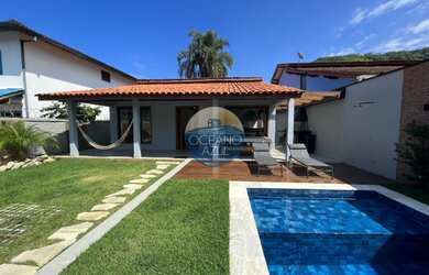 Imagem: A casa possui 3 Dormitórios, 3 Suítes, 4 Banheiros, 2 Vagas