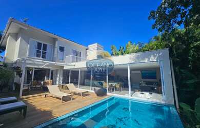 Imagem: A casa em condomínio possui 5 Dormitórios, 5 Suítes, 6 Banheiros