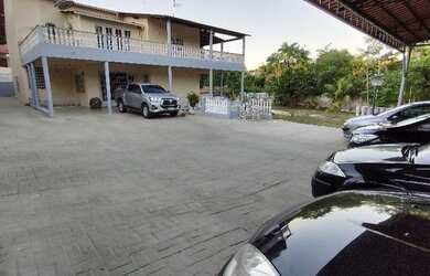 Imagem: A casa possui 6 Dormitórios, 5 Suítes, 1 Banheiro, 10 Vagas