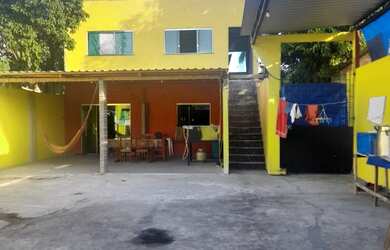 Imagem: A casa possui 3 Dormitórios, 1 Suíte, 1 Banheiro, 5 Vagas