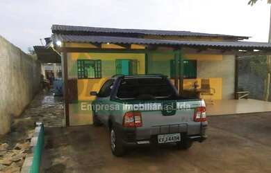 Imagem: A casa possui 3 Dormitórios, 2 Suítes, 1 Banheiro, 3 Vagas