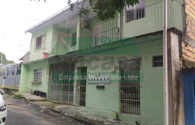 Imagem: A casa possui 7 Dormitórios, 1 Banheiro, 1 Vaga na garagem