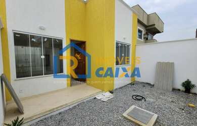 Imagem: A casa possui 2 Dormitórios, 1 Suíte, 2 Banheiros, 1 Vaga