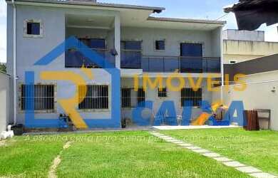 Imagem: A casa possui 4 Dormitórios, 1 Suíte, 3 Banheiros, 4 Vagas