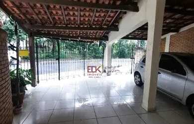 Imagem: A casa possui 4 Dormitórios, 5 Banheiros, 2 Vagas na garagem