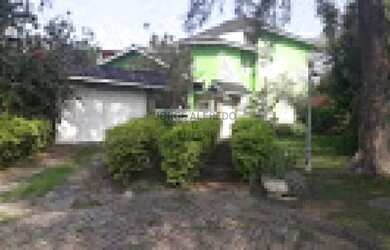 Imagem: A casa em condomínio possui 5 Dormitórios, 5 Banheiros, 4