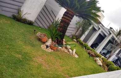 Imagem: A casa possui 3 Dormitórios, 5 Banheiros, 5 Vagas na garagem