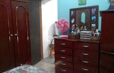 Imagem: A casa possui 3 Dormitórios, 2 Banheiros, 2 Vagas na garagem