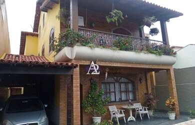 Imagem: A casa possui 5 Dormitórios, 4 Banheiros, 287m² de Área e