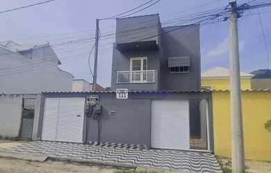 Imagem: A casa possui 2 Dormitórios, 1 Banheiro, 2 Vagas na garagem